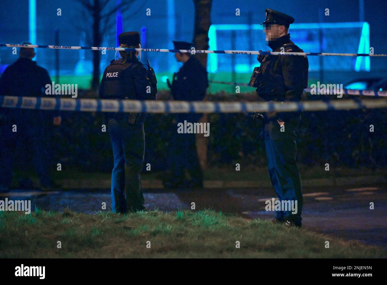 PSNI officers at the scene of a shooting in the Killyclogher Road area