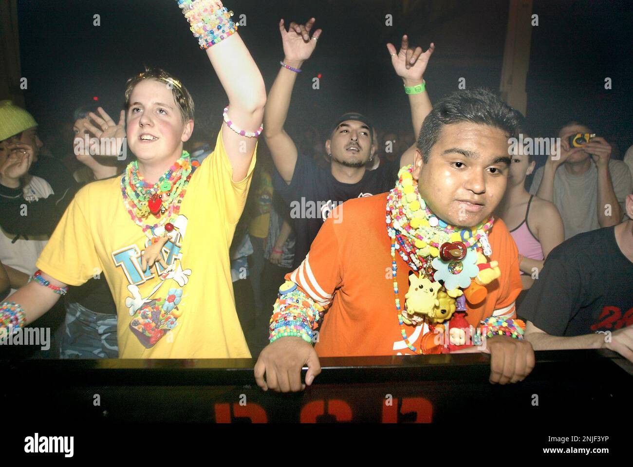 CHEMICAL29b-C-27APR02-DD-LH--Candy ravers Sponge Bob (left) and Slinky (right) listening to Sasha at the Cow Palace. (PHOTOGRAPHED BY LIZ HAFALIA/THE SAN FRANCISCO CHRONICLE) (LIZ HAFALIA/San Francisco Chronicle via AP) Stock Photo