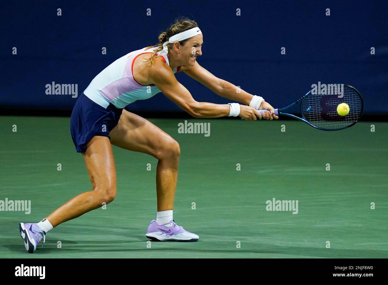 Victoria Azarenka, of Belarus, returns a shot to Ashlyn Krueger, of the