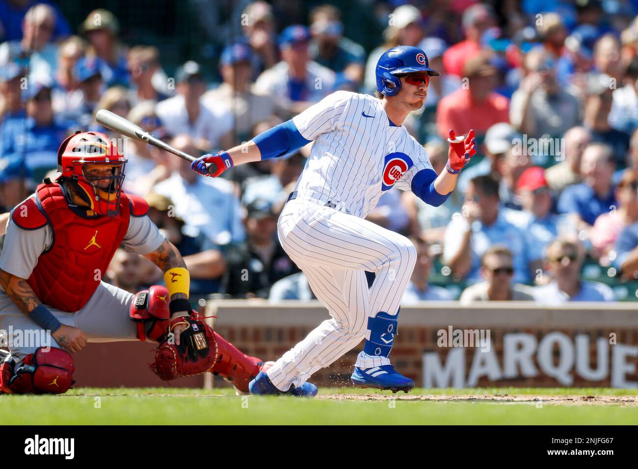 CHICAGO, IL - AUGUST 23: Chicago Cubs second basemen Zach McKinstry (6)  hits a single in the third inning during game 1 of a doubleheader between  the St. Louis Cardinals and Chicago