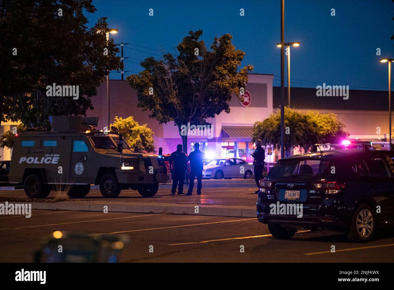 Emergency personnel respond to a shooting at the Forum shopping center