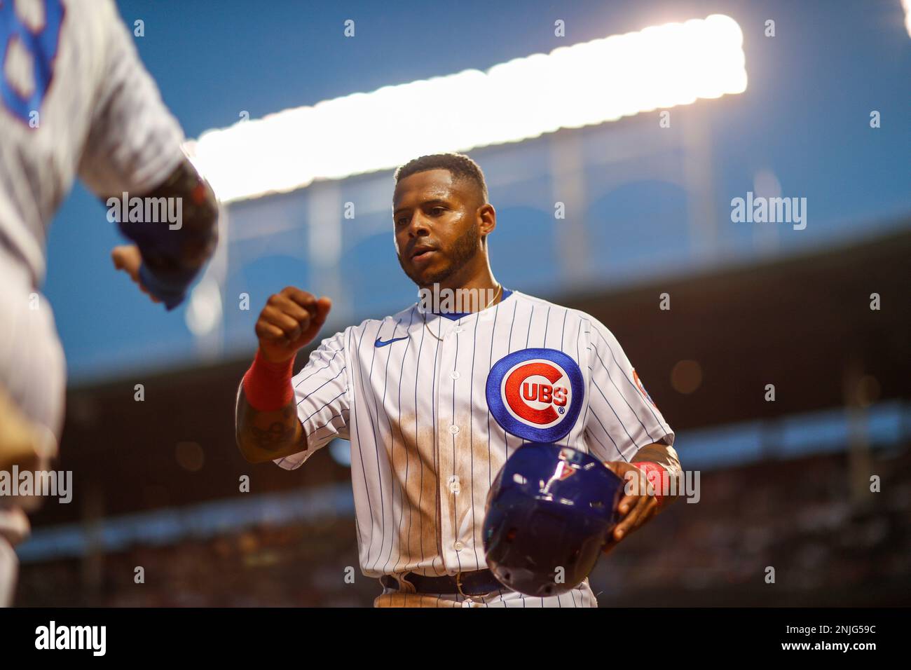 CHICAGO, IL - AUGUST 24: Chicago Cubs center fielder Nelson Velazquez (4)  walks off the field at the end of the second inning during a regular season  game between the St. Louis