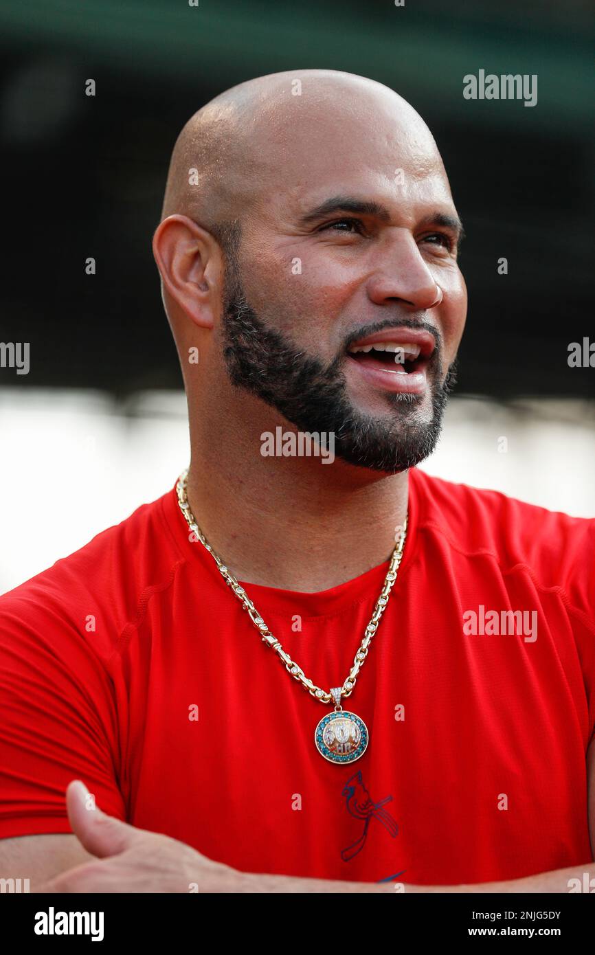 CHICAGO, IL - AUGUST 24: St. Louis Cardinals first baseman Albert Pujols  (5) wears a necklace commenting the 600 home run club during batting  practice prior to a regular season game between