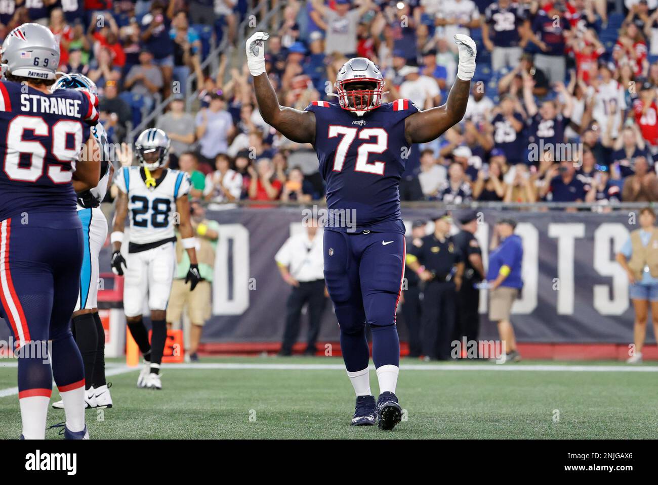 FOXBOROUGH, MA - AUGUST 19: New England Patriots offensive tackle Yodny  Cajuste (72) celebrates a touchdown during an NFL preseason game between  the New England Patriots and the Carolina Panthers on August