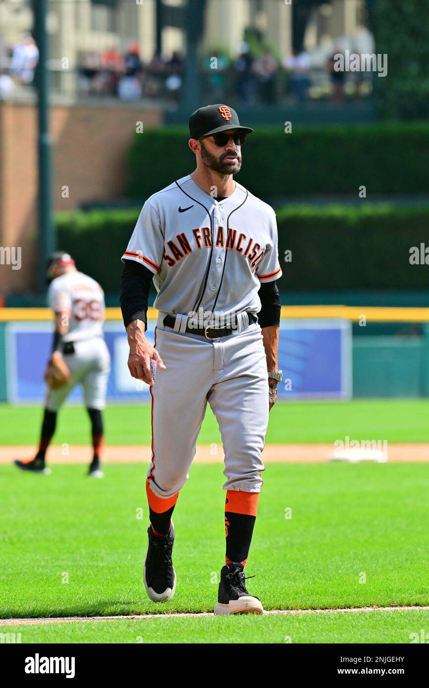 DETROIT, MI - AUGUST 24: San Francisco Giants manager Gabe Kapler (19)  walks back to the mound after a pitching change during the Detroit Tigers  versus the San Francisco Giants on Wednesday