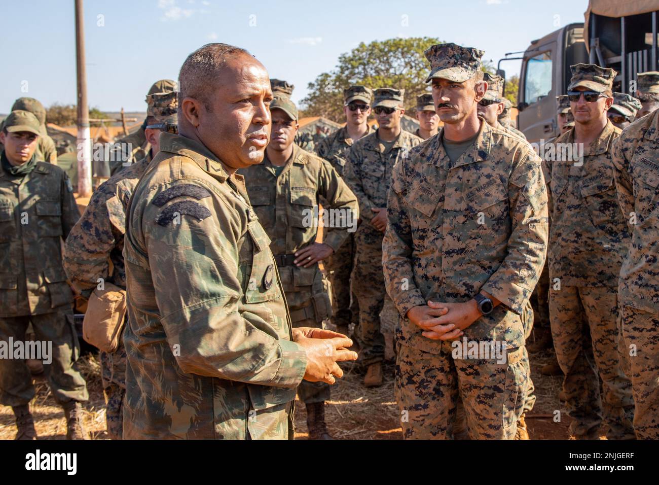U.S. Marine Corps GySgt. Christopher Gentry (right), company gunnery