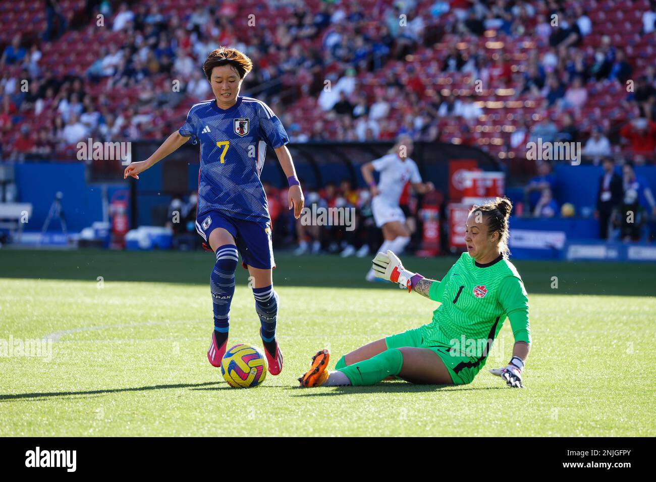Japan’s Hinata Miyazawa (7) beats Canada goalie Allen Sheridan but is