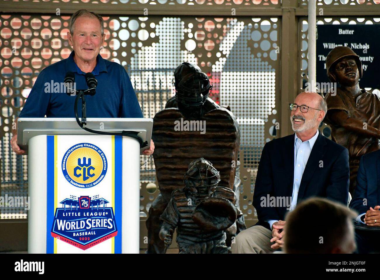 Pennsylvania Gov. Tom Wolf, right, and former President W. Bush