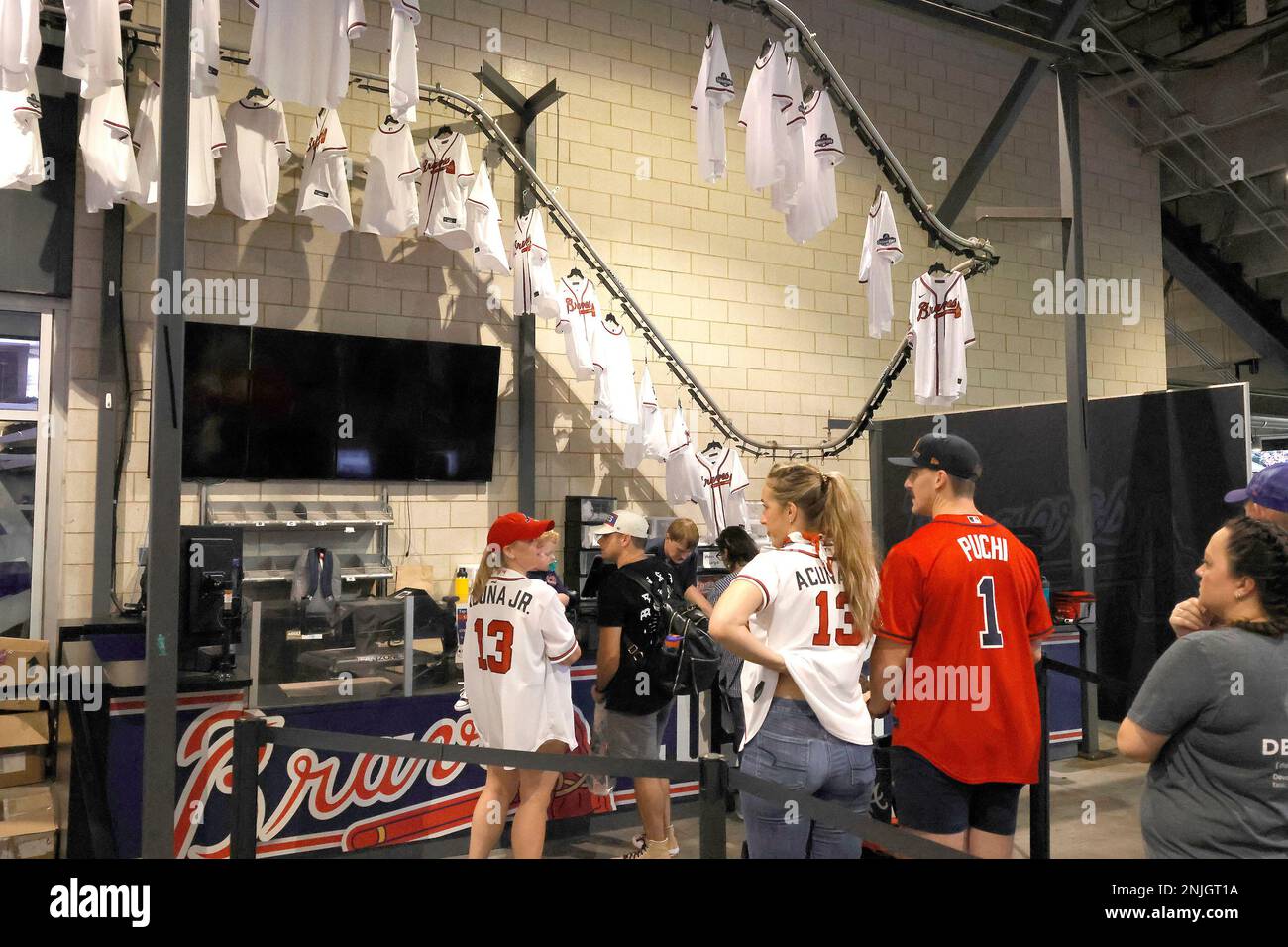 ATLANTA, GA - AUGUST 20: Fans stand in line to order custom Braves