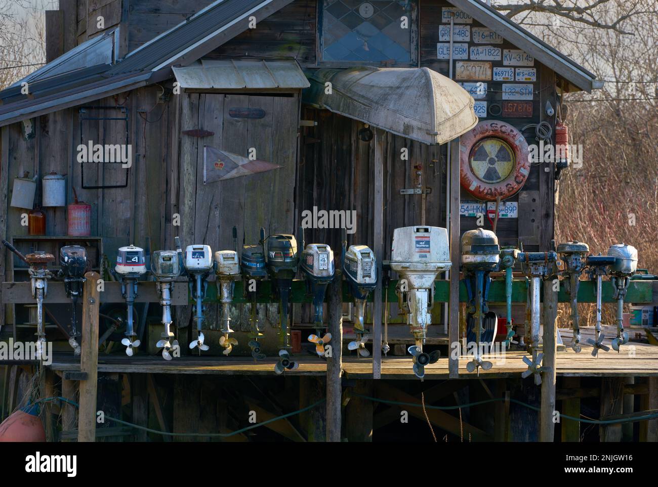 Richmond, British Columbia, Canada – February 18, 2023. Finn Slough Outboard Boat Motors. Old outboard motors on a deck in Finn Slough. Stock Photo