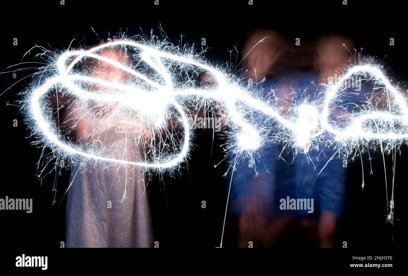 Kids with sparklers, celebrating 4th of July Stock Photo Alamy