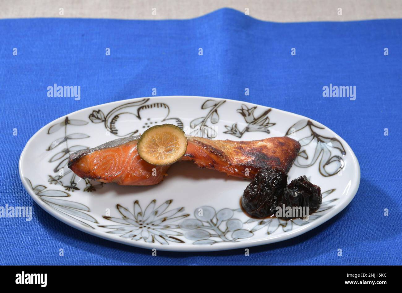 A picture shows a dish of fried salmon flavored with Yuanji in Tokyo