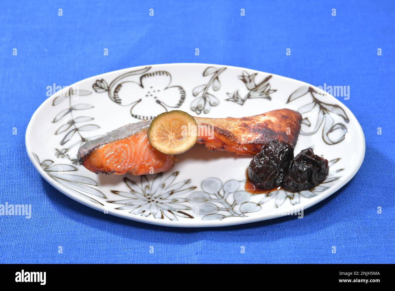 A picture shows a dish of fried salmon flavored with Yuanji in Tokyo