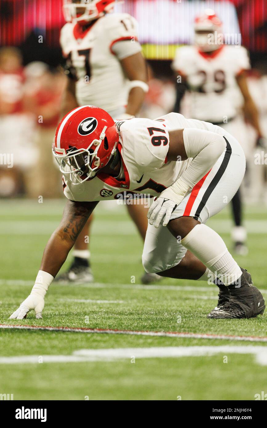 defensive lineman Warren Brinson (97) lines up at the line of
