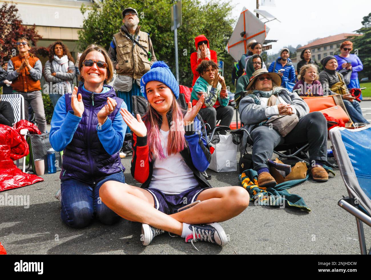 l-r) Fans Emiliana Simon-Thomas and daughter Sybille Simon-Thomas, 11 cheer as they watch the celebration ceremony after the USA defeated the Netherlands to win the FIFA Womens World Cup Finals in Berkeley,