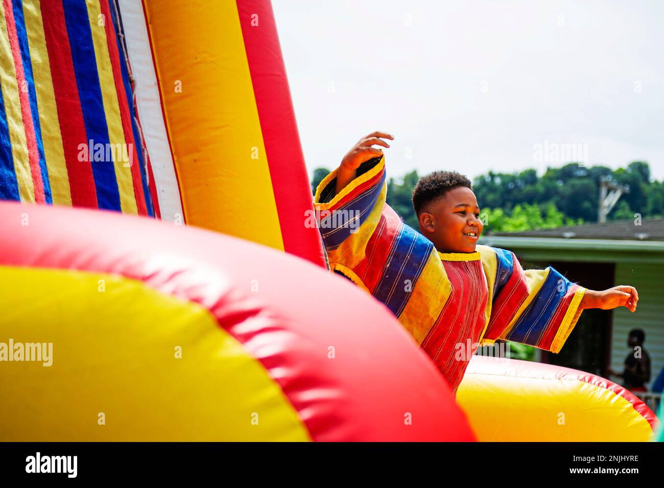 Tenyearold Duquesne resident, Jaziere Brock, jumps in a velcro suit