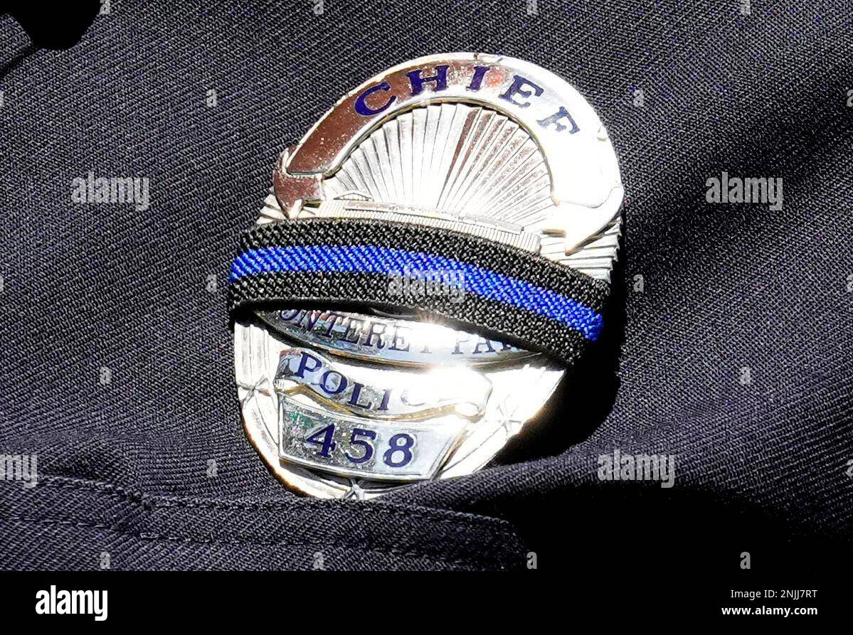 The badge of Monterey Park Chief of Police Kelly Gordon as she speaks  during a news conference regarding the fatal shooting of an off-duty  Monterey Park police officer Gardiel Solorio, 26, of, image size:1199x893