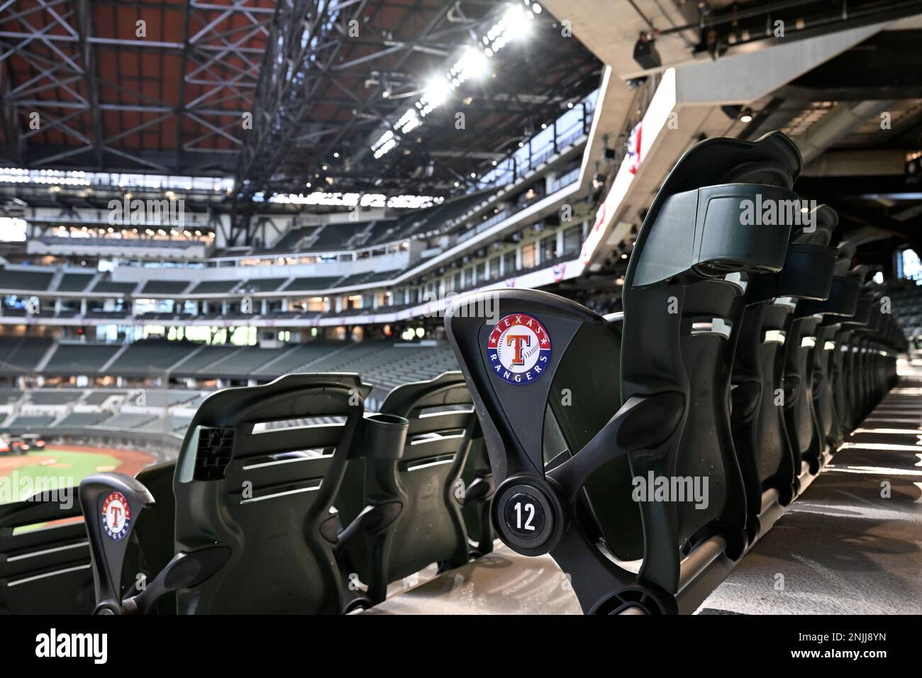 The Texas Rangers logo is seen on the end of a row of seats at Globe Life  Field in Arlington, Texas on Wednesday, April 6, 2022. (Matt Patterson via  AP Stock Photo - Alamy