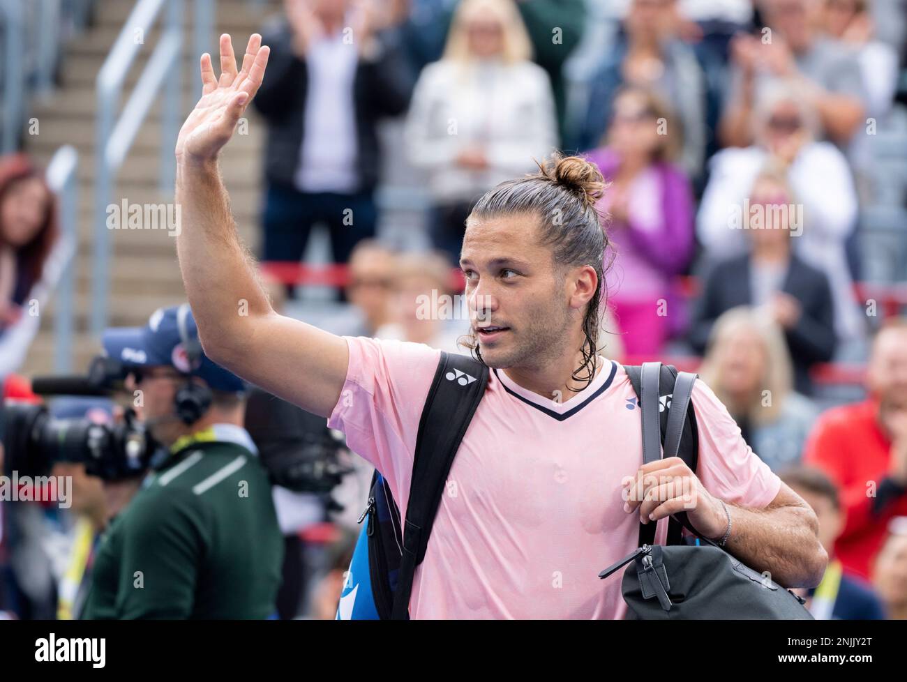 Alexis Galarneau Of Canada Walks Off The Court After Losing To Grigor