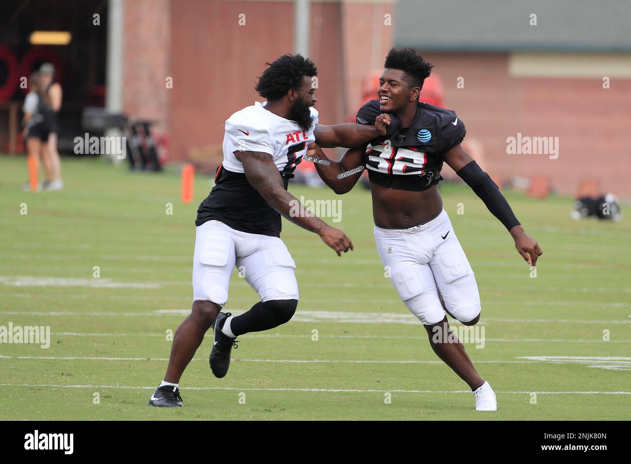 FLOWERY BRANCH, GA - AUGUST 06: Atlanta Falcons running back Damien  Williams (6) and Atlanta Falcons safety Jaylinn Hawkins (32) during  Saturday morning workouts at the Falcons Training Facility on August 06,