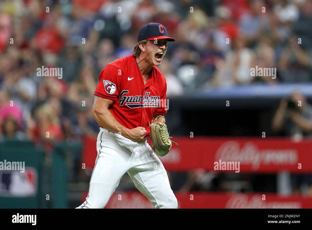 CLEVELAND, OH - AUGUST 01: Cleveland Guardians relief pitcher James  Karinchak (99) reacts after striking out Arizona Diamondbacks designated  hitter Seth Beer (28) (not pictured) to end the eighth inning of the