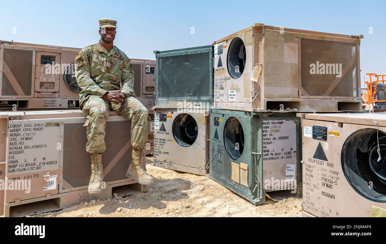 U.S. Air Force Tech. Sgt. Lawton Rich, a heating, ventilation, and air conditioning craftsman with the 378th Expeditionary Civil Engineer Squadron, poses with HVAC units at Prince Sultan Air Base, Kingdom of Saudi Arabia, Aug. 9, 2022. Rich won the month of July’s Unsung Hero award, presented by the PSAB Top 3 Association, which recognizes up-and-coming leaders within the ranks of E5 and E6 who exemplify their service’s core values, inspire others and contribute to the improvement of customer service and the overall mission. Stock Photo