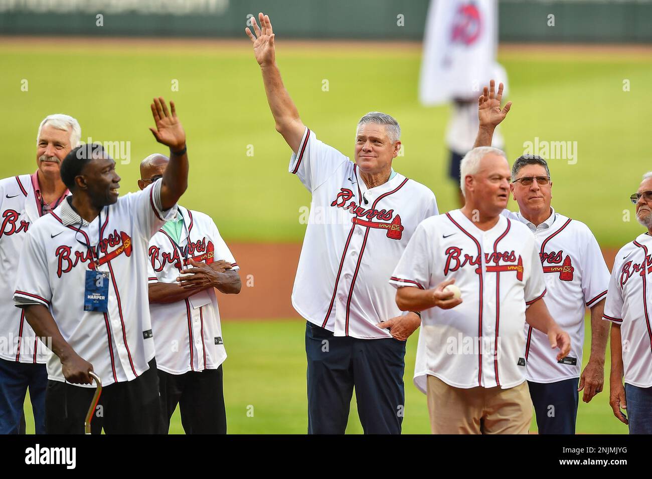 ATLANTA, GA – JULY 29: Atlanta Braves legend Dale Murphy (center) waves to  the crowd during pre-game festivities prior the the start of the MLB game  between the Arizona Diamondbacks and the