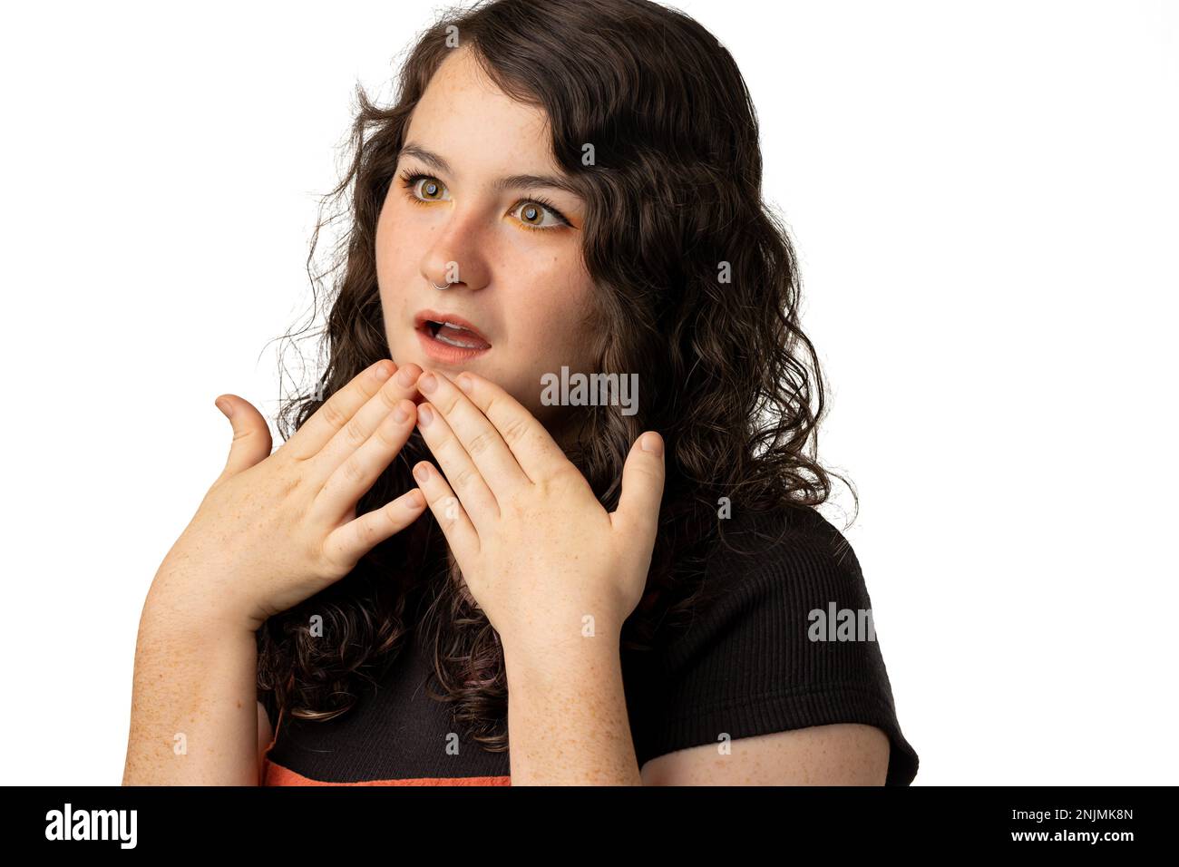 Beautiful woman with surprised gesture on white background Stock Photo