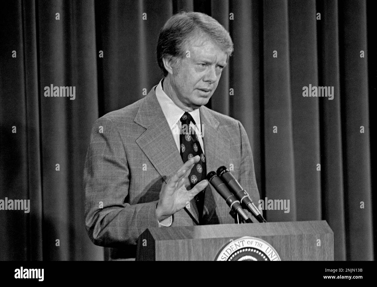 United States President Jimmy Carter conducts the first nationally televised press conference of his administration in the in the Old Executive Office Building on the White House campus in Washington, DC on February 8, 1977. Credit: Benjamin E. 'Gene' Forte/CNP Stock Photo