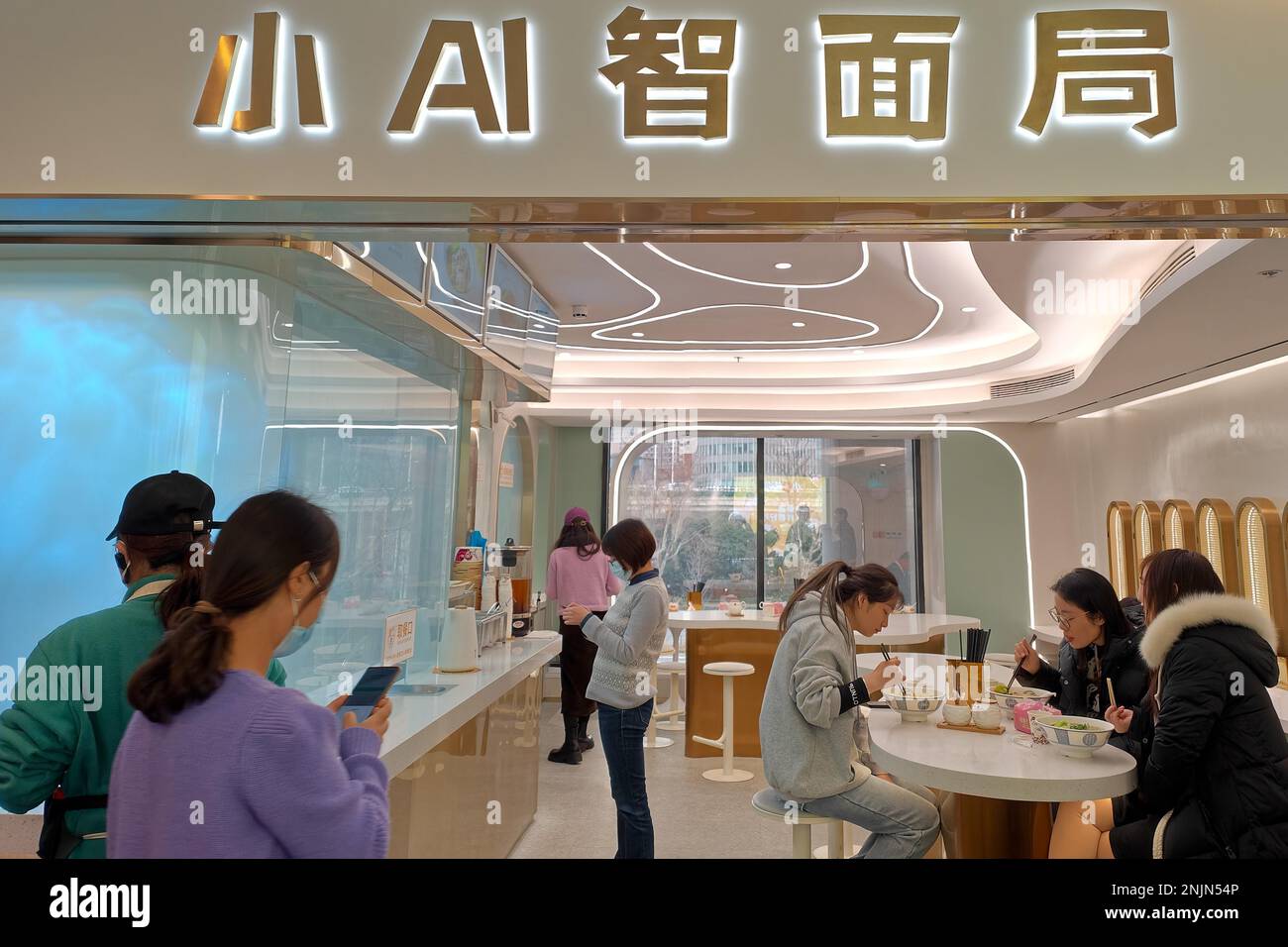 A noodle restaurant with a robot chef appears in Changning District, Shanghai, China, 22