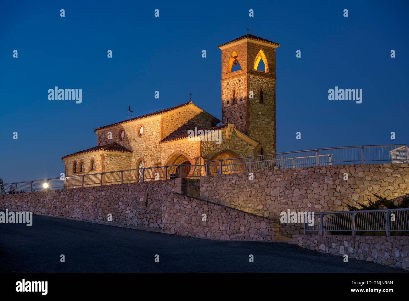 Nuestra Señora del Pilar Hermitage and Ebro viewpoint, on a hill between the town of Fayón old village and Fayón new village at night (Aragon, Spain) Stock Photo