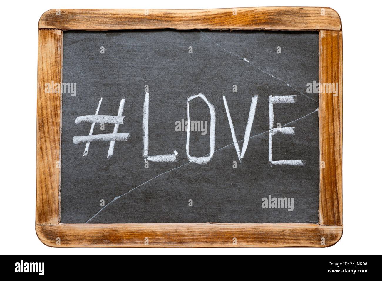 love hashtag handwritten on vintage school slate board isolated on white Stock Photo