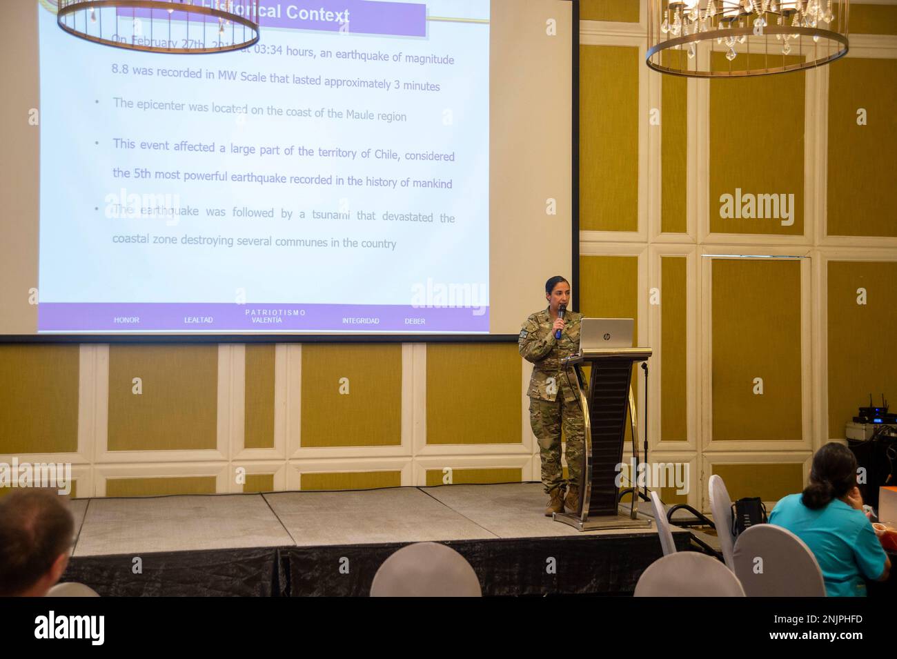 PUERTO PRINCESA, Philippines (Aug. 9, 2022) – Lt. Cmdr. Carolina Sepulveda, with the Chilean Navy, discusses earthquake and tsunami effects during a Physician Continuing Medical Education presentation at Hue Hotel in support of Pacific Partnership 2022. Now in its 17th year, Pacific Partnership is the largest annual multinational humanitarian assistance and disaster relief preparedness mission conducted in the Indo-Pacific. Stock Photo