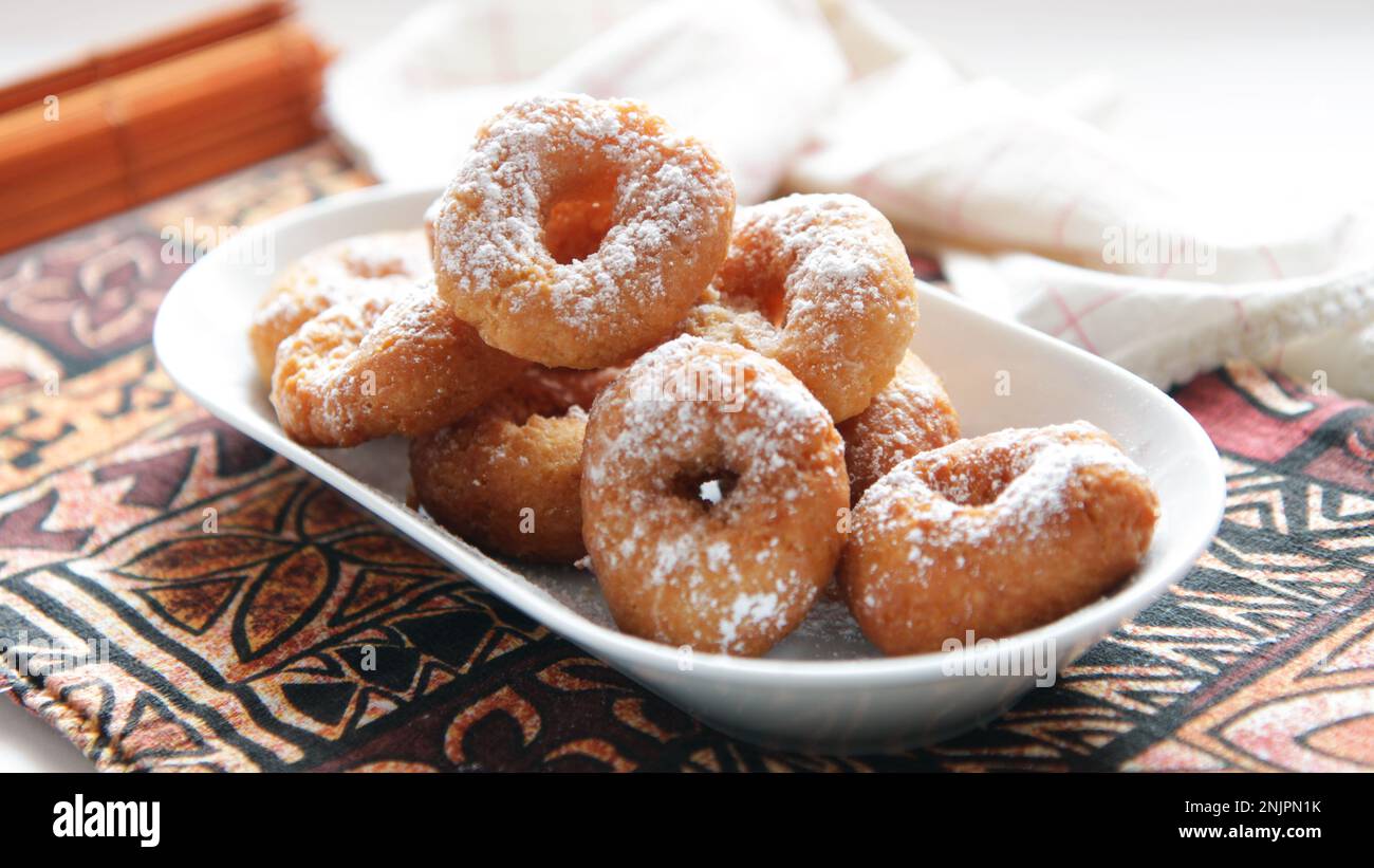 Traditional Spanish fried donuts made with lemon and cinnamon Stock