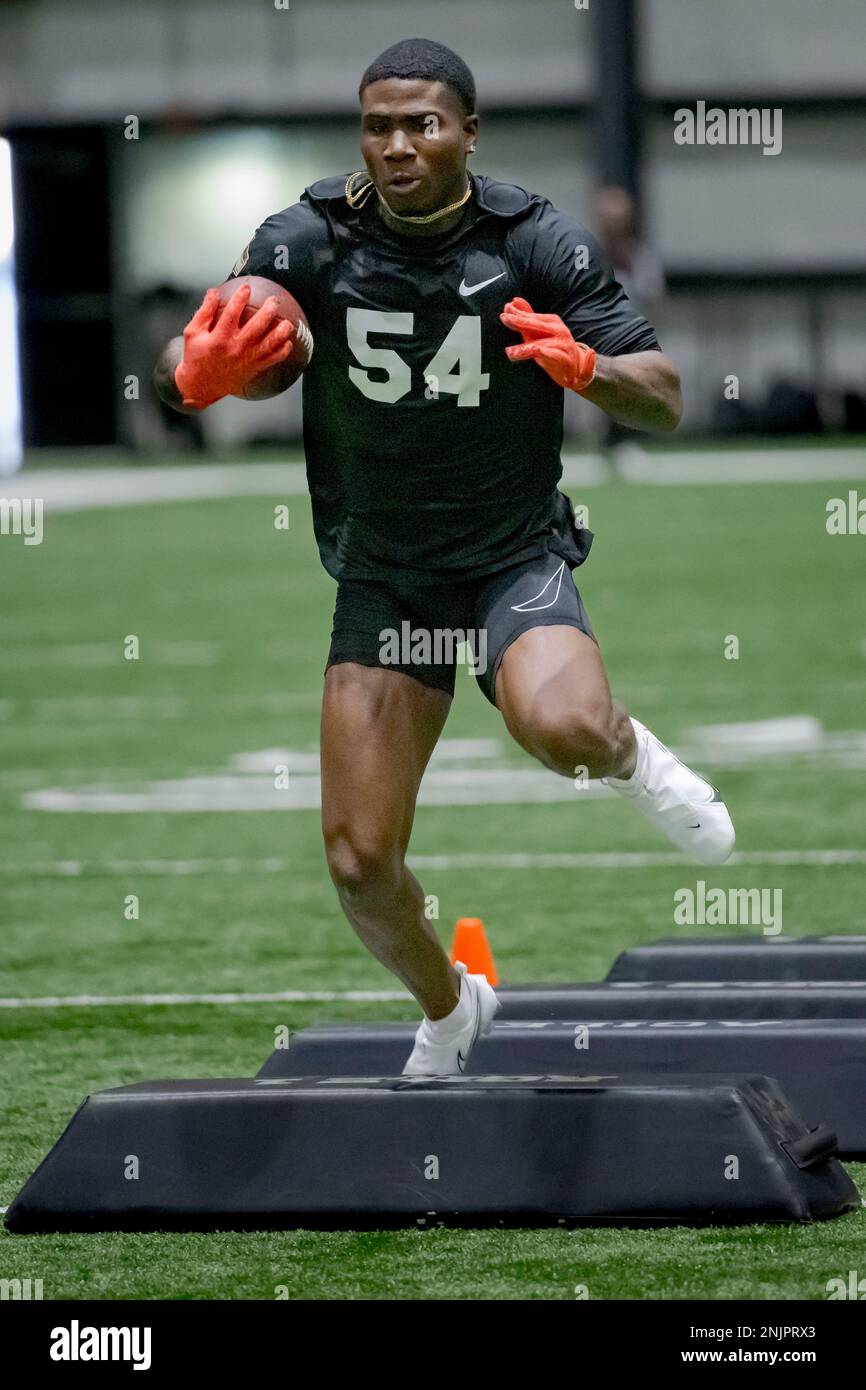 Running back Tyler King of Edward Waters University runs a drill