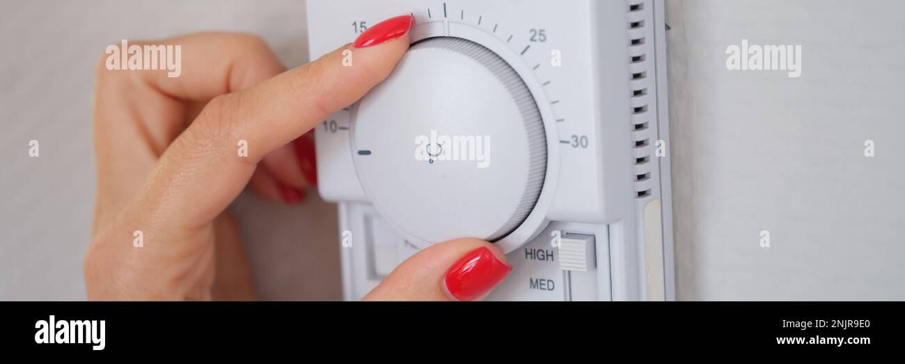Manually adjust temperature in central heating control panel