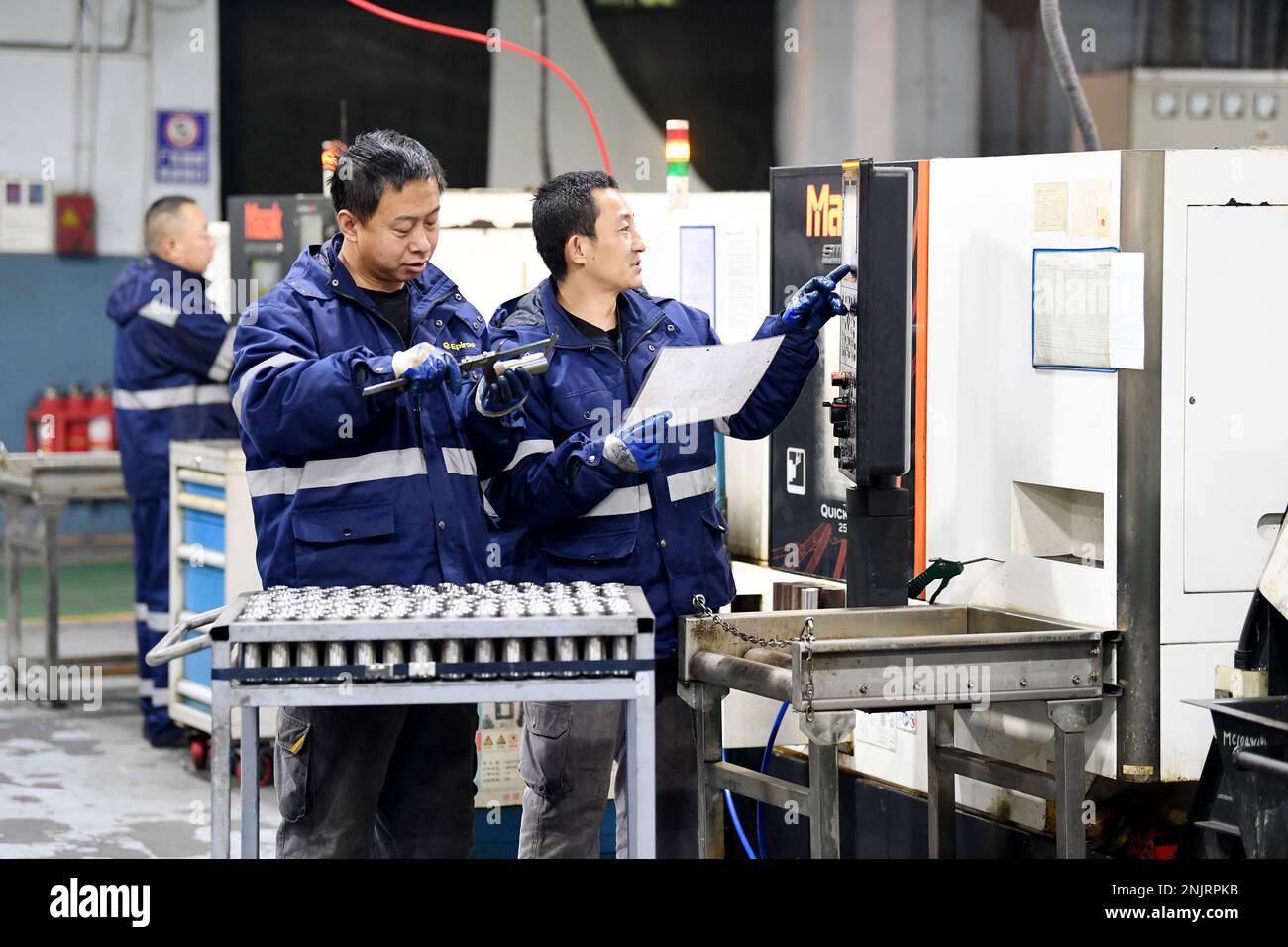 ZHANGJIAKOU, CHINA - FEBRUARY 23, 2023 - A worker works on a drilling tool  production line at Xuanhua Economic Development Zone in Zhangjiakou, Hebei  province, China, Feb 23, 2023. At present, there