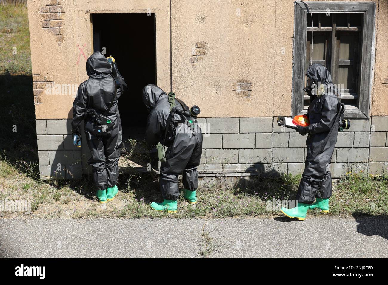 U.S. Marine Corps, Combat Logistics Regiment 4, Chemical Biological Radiological Nuclear Platoon refining Search and Recovery techniques in a contaminated environment at Northern Strike 22-2 in Grayling, Mich., Aug. 8, 2022. Northern Strike encompasses a collection of unique environments, premier training venues and provides the operational and developmental framework required to fully integrate joint all domain training. Stock Photo