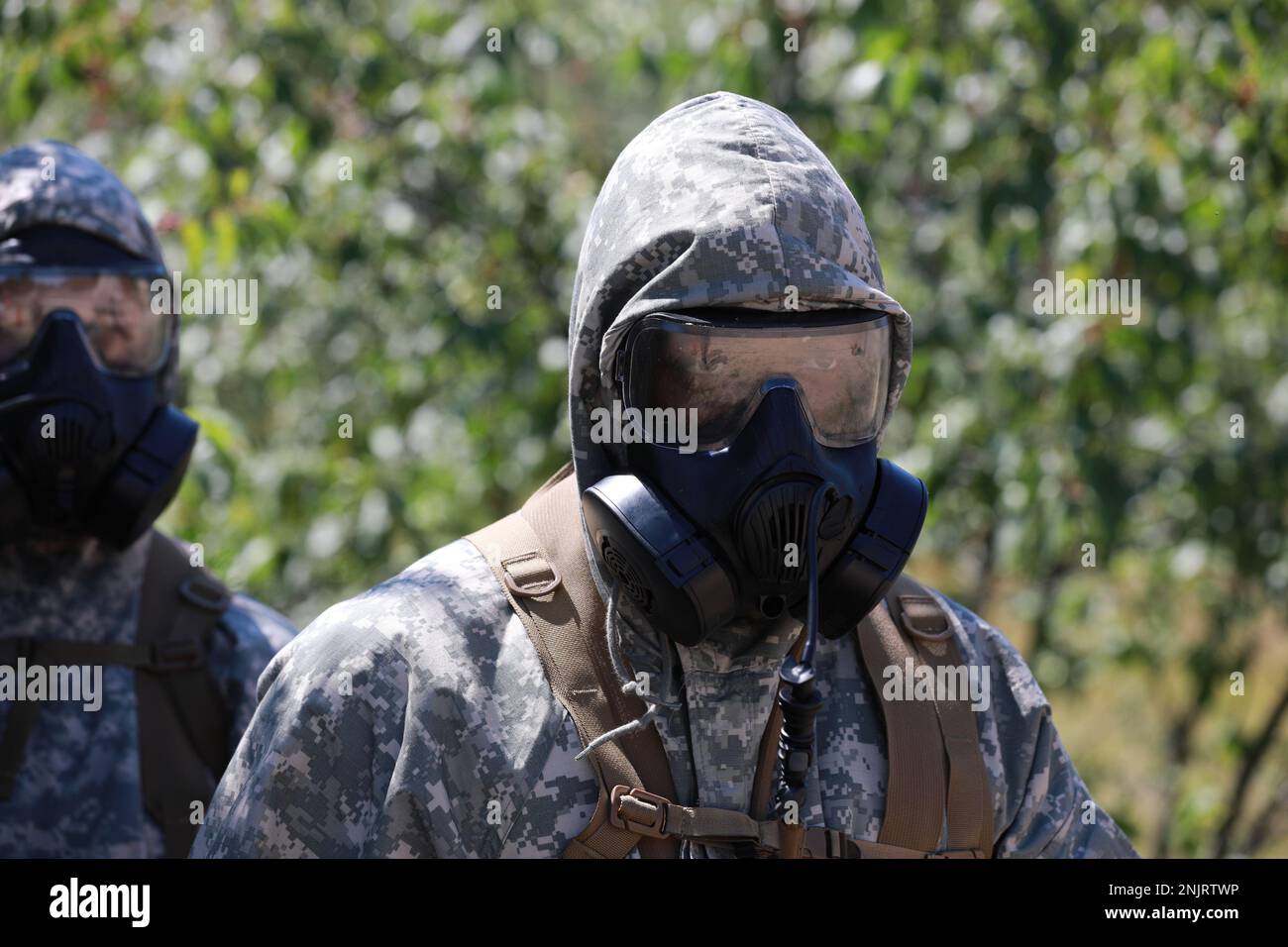 U.S. Marine Corps, Combat Logistics Regiment 4, Chemical Biological Radiological Nuclear Platoon train on Search and Recovery decontamination lanes at Northern Strike 22-2 in Grayling, Mich., Aug. 8, 2022. Northern Strike encompasses a collection of unique environments, premier training venues and provides the operational and developmental framework required to fully integrate joint all domain training. Stock Photo