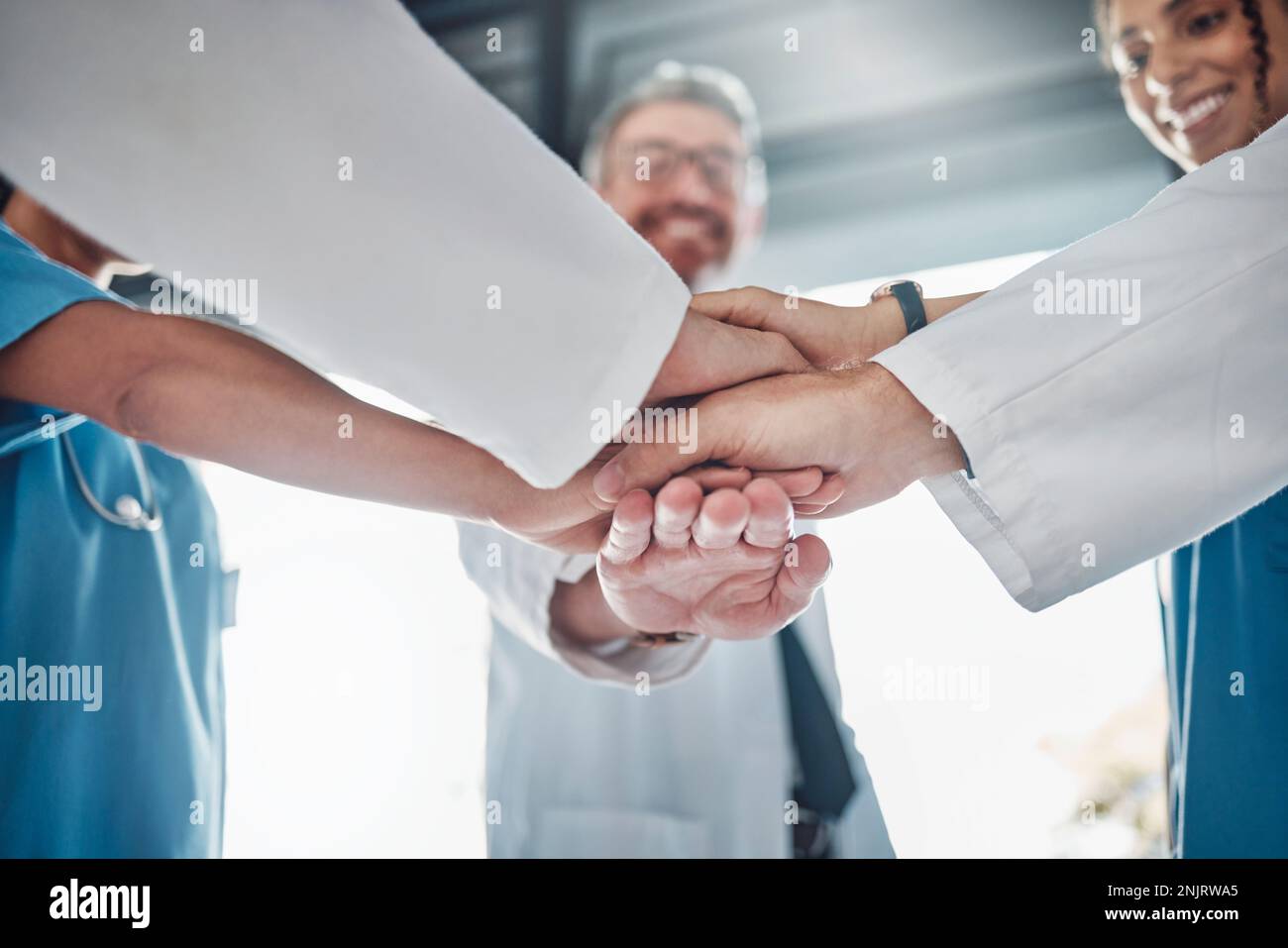 Doctors Unity Hand Doctor, team and hands together in healthcare agreement, trust or ...
