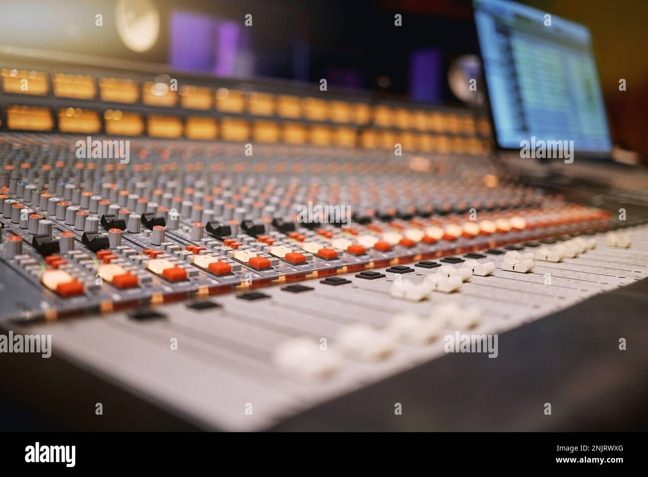 Music studio full of instruments and pc display Stock Photo - Alamy