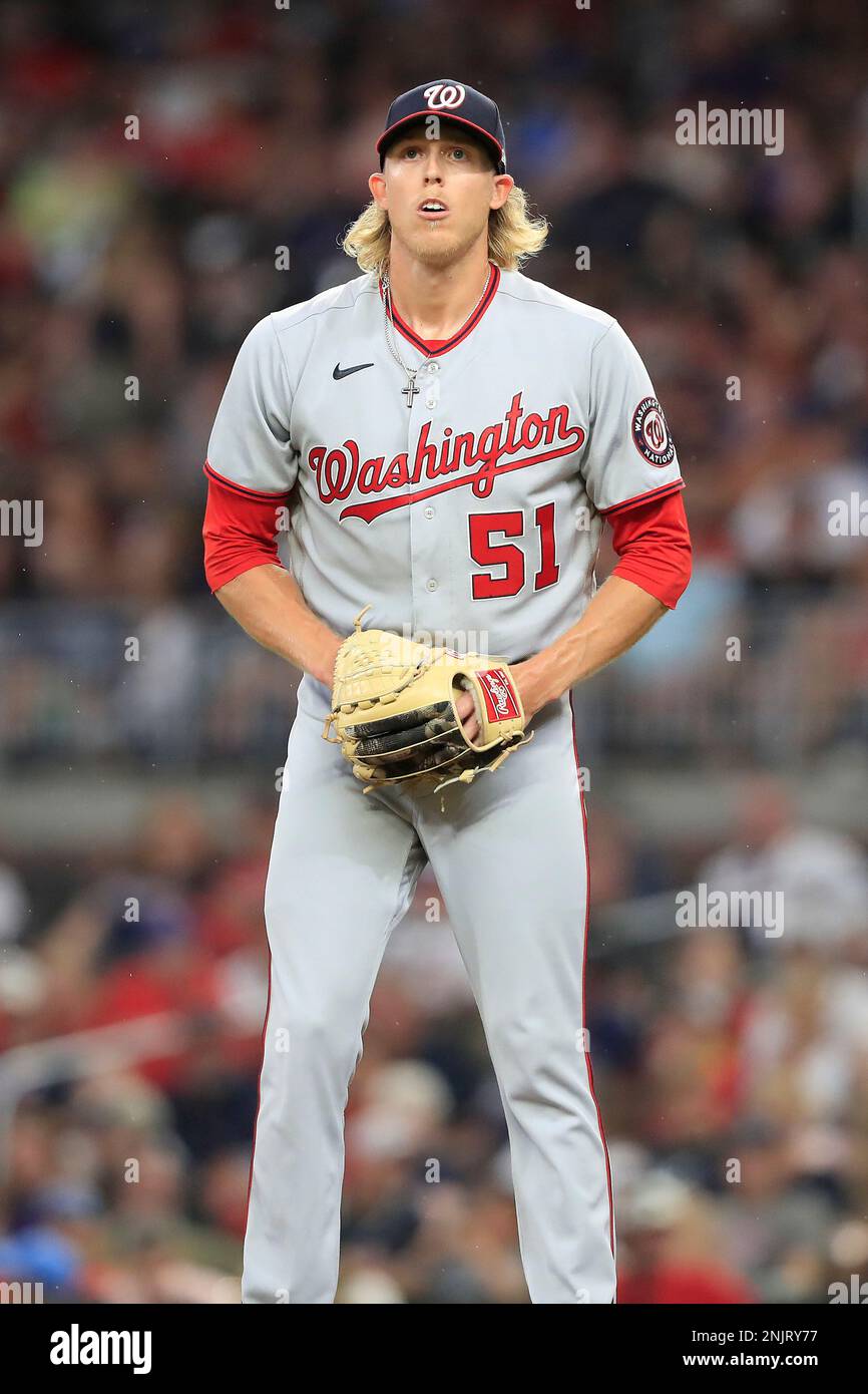 ATLANTA, GA - JULY 08: Washington Nationals relief pitcher Jordan Weems  (51) prepares to deliver a pitch during the Friday evening MLB game between  the Washington Nationals and the Atlanta Braves on
