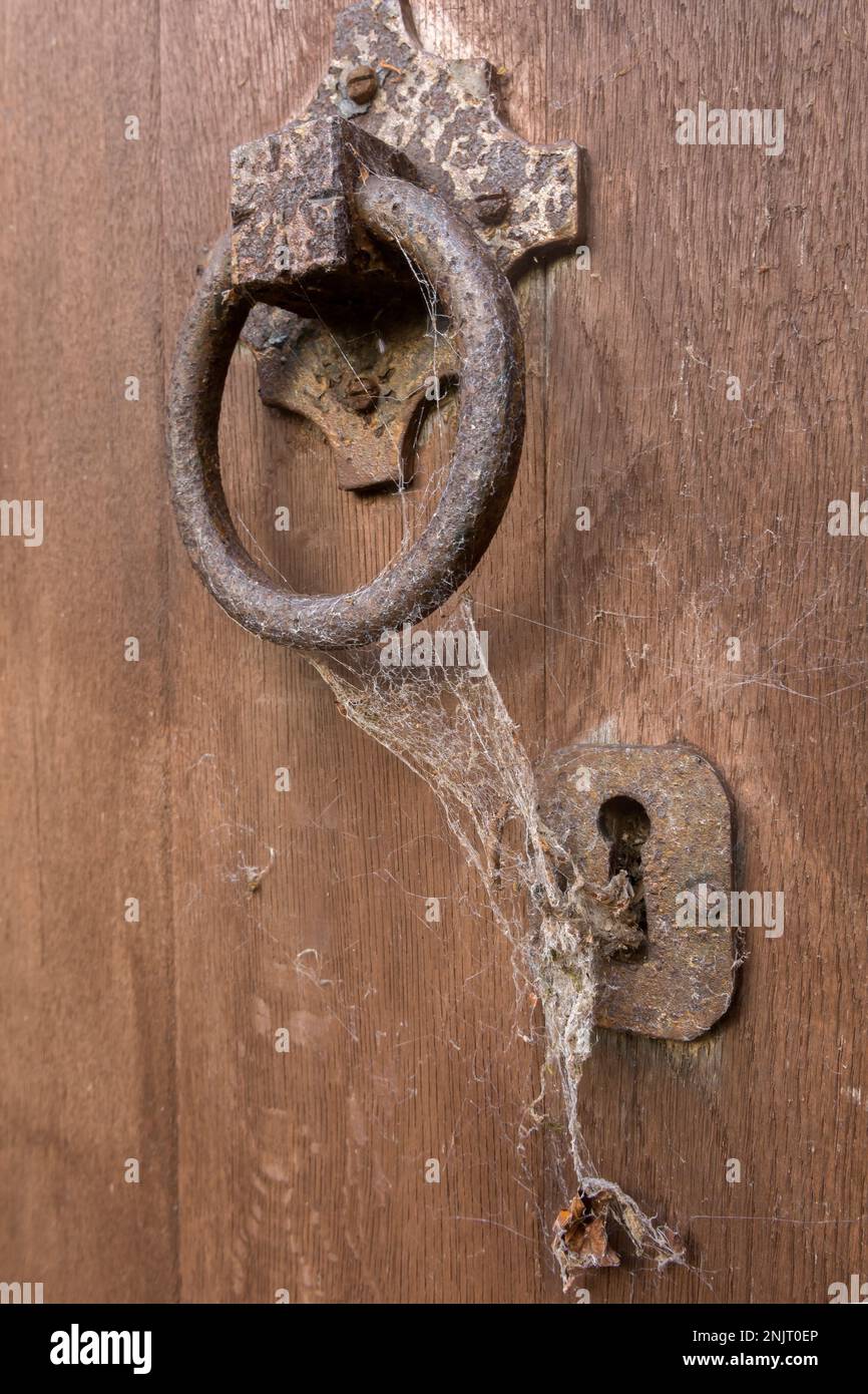 Large church door handle with texture from corrosion Stock Photo