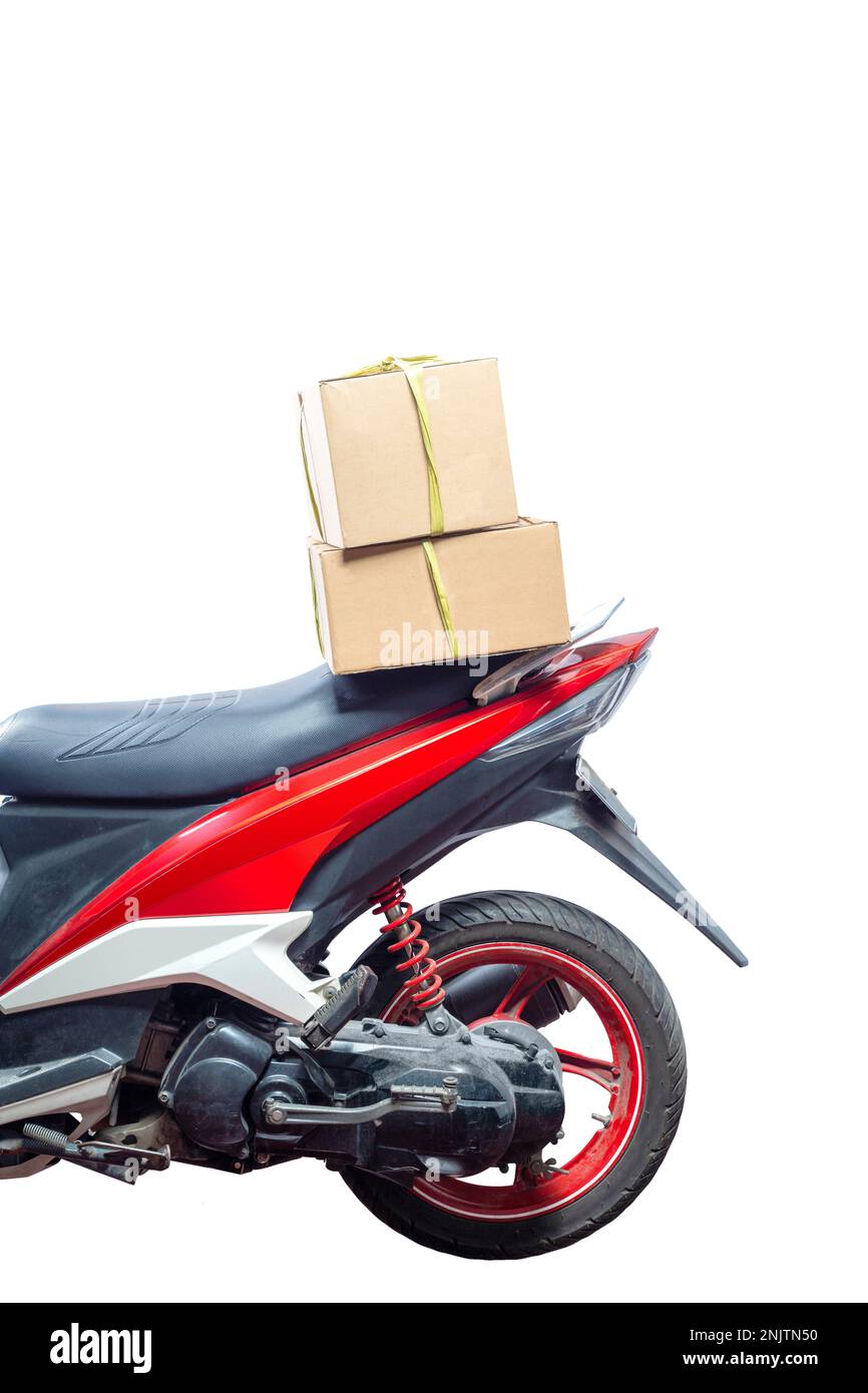 Box tied on motorcycle, prepare for mudik isolated over white background Stock Photo