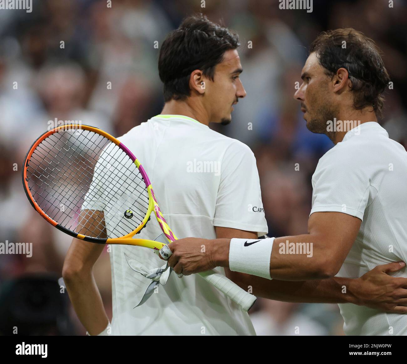 Rafael Nadal (R) of Spain defeats Lorenzo Sonego of Italy during the game of the gentlemens singles third-round match in the Championships, Wimbledon at All England Lawn Tennis and Croquet Club in