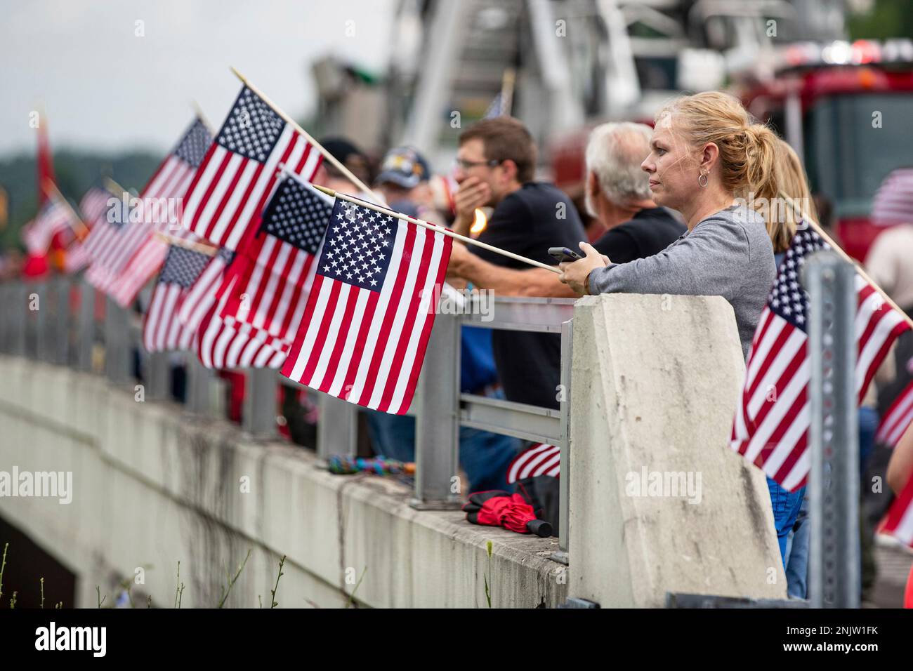 Area residents arrive to show their respect before the funeral