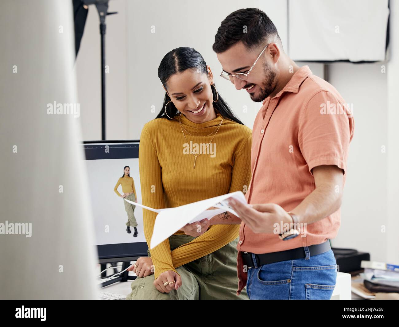 Documents, collaboration or photoshoot with a photographer and model in ...