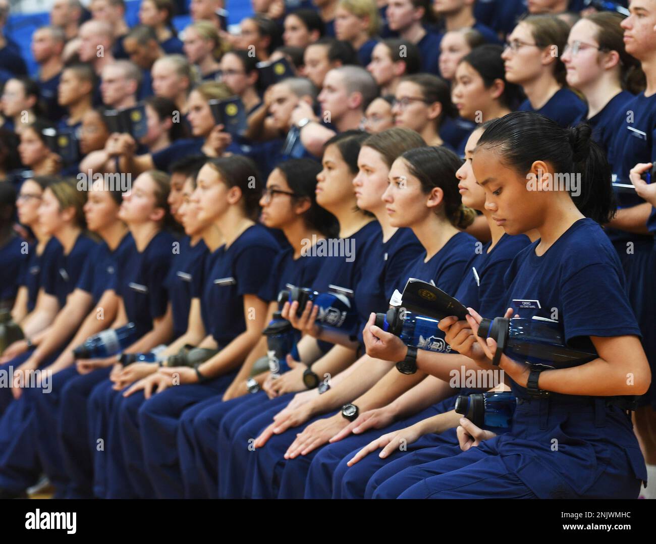 Swab Aiana Cayao keeps her eyes on her "Running Light" guidebook as she