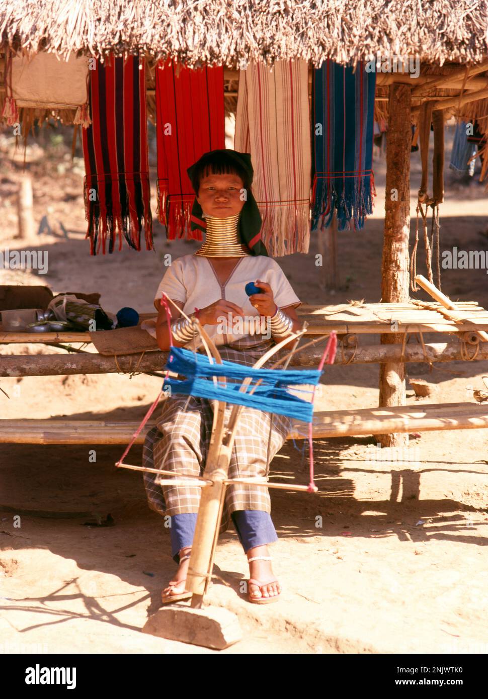 Thailand: Padaung (Long Neck Karen), village near Mae Hong Son. The Padaung or Kayan Lahwi or Long Necked Karen are a subgroup of the Kayan, a mix of Lawi, Kayan and several other tribes. Kayan are a subgroup of the Red Karen (Karenni) people, a Tibeto-Burman ethnic minority of Burma (Myanmar). Stock Photo