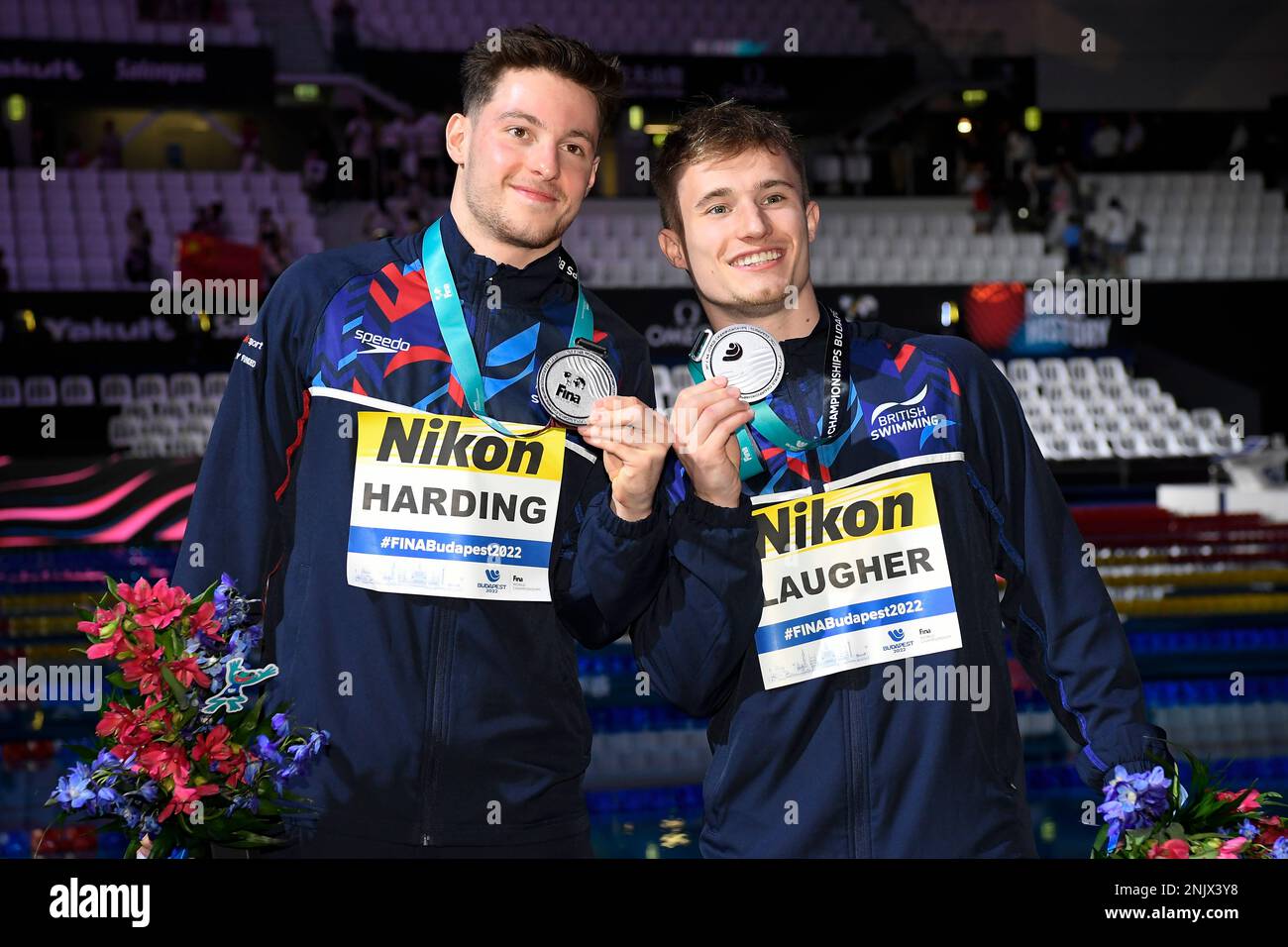 Silver medal winner Jack Laugher and Anthony Harding of Britain pose